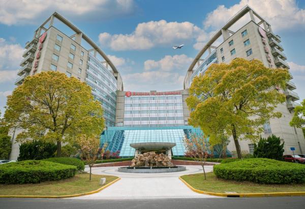 Ramada Plaza Shanghai Pudong Airport - 3 mins to PVG depature floor & check entrance with hotel shuttle, Shanghái