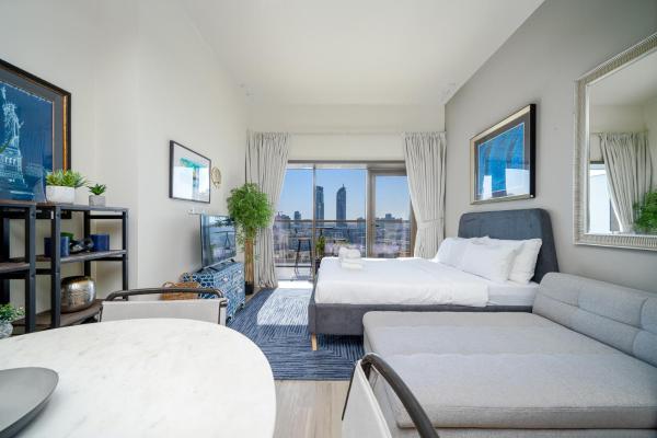 Na fotografii je vidět objekt ALH Vacay 715- Stunning Studio in JVC nacházející se ve městě Dubaj.