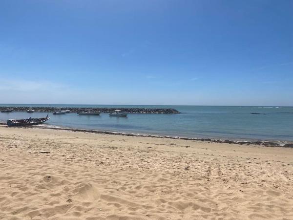 Foto 9: Case beach