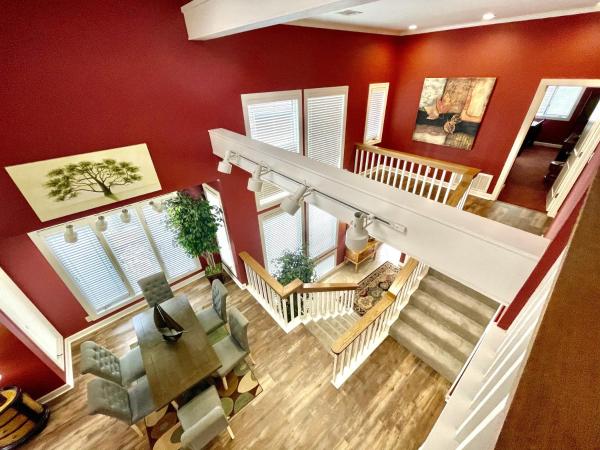 La photo montre l'objet 80BPD, Four bedroom, two 1 2 bath log-sided condo with lake view , garage condo situé dans la ville de Mount Ida.
