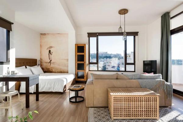 A la foto es mostra l'objecte Explore Nightlife Near an Apartment With an Acropolis View situat a la ciutat de Atenes.