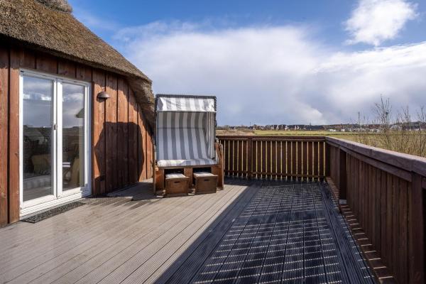 Na fotografii je vidět objekt Fischerhaus am Strand Appartement Kuschelnest nacházející se ve městě Brösum.