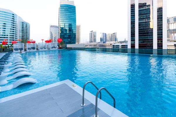 Na fotografii je vidět objekt Lux Studio in Downtown, 5 mins to Burj Khalifa & Dubai Mall - MAG318 nacházející se ve městě Dubaj.