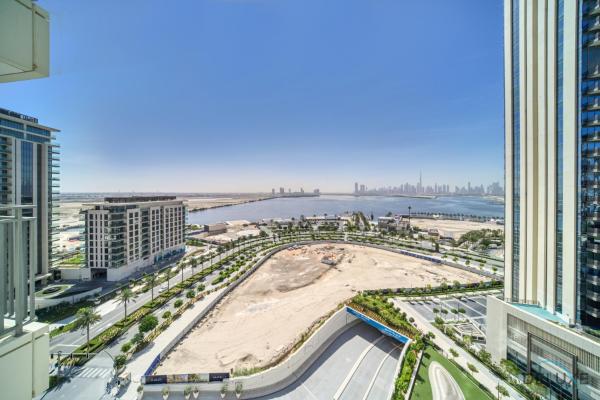 Na fotografii je vidět objekt Captivating 1BR at 17 Icon Bay Dubai Creek Harbour by Deluxe Holiday Homes nacházející se ve městě Dubaj.