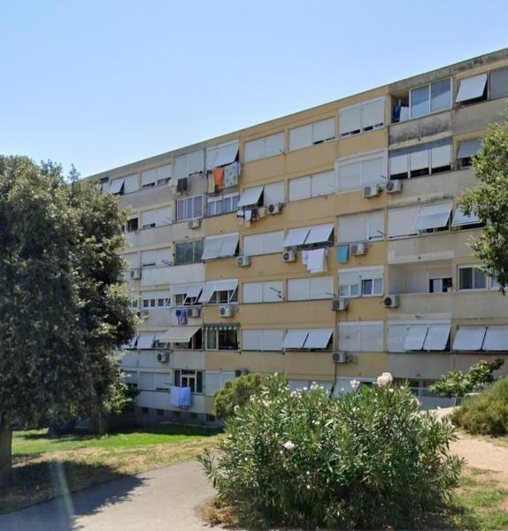 The photo shows the Apartments with WiFi Split - 20017 located in the city of Split.