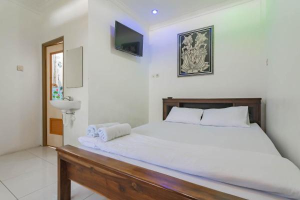 写真にはGenteng市にあるErika Homestay Lembang Mitra RedDoorzが写っています。