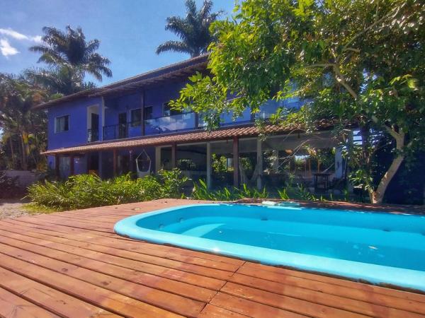 The photo shows the Pousada Tropicália Paraty located in the city of Paraty.