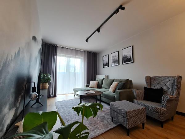 Na zdjęciu widoczny jest obiekt Komfortowy Apartament Pod Lasem Villa Fonte 21 Polanica Zdrój położony w mieście Wolany.