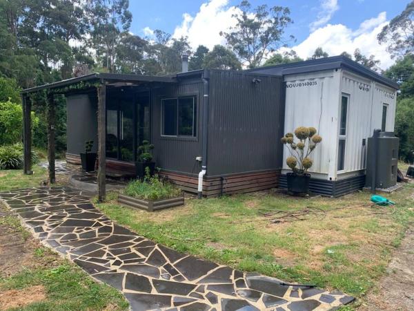 The photo shows the The Container House located in the city of Ballan.