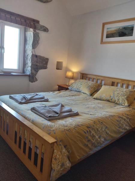 Na fotografii je vidět objekt Family stay by the beach nacházející se ve městě Chwilog.