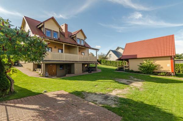 Na fotografii je vidět objekt Domki Letniskowe Corleone nacházející se ve městě Ostrowo.