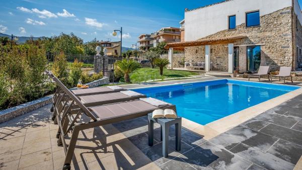 A la foto es mostra l'objecte VILLA GALLUS 6, Emma Villas situat a la ciutat de Taormina.