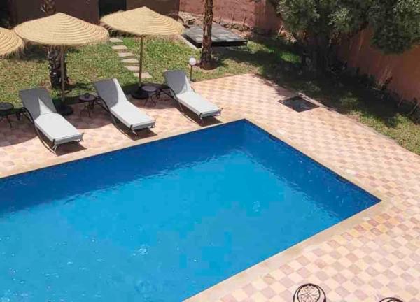 На фото показан объект Villa privative tortues2 piscine chauffée 35min Marrakech, расположенный в городе Akkara.