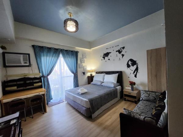 A la foto es mostra l'objecte Condo Azur Suites A326 Amani Resorts Residences , 5 minutes Airport, Netflix, Stylish, Cozy with Luxurious Swimming Pool situat a la ciutat de Pusok.