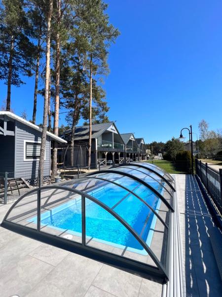 Na fotografii je vidět objekt Domki Albertówka - Strefa Relaksu nacházející se ve městě Ostrowo.