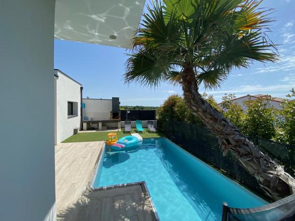 La photo montre l'objet Superbe villa plain-pied avec piscine situé dans la ville de Servian.