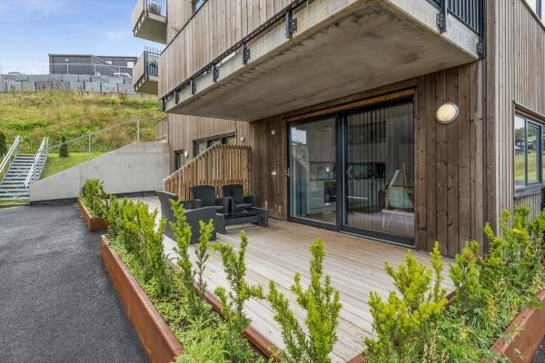 The photo shows the JECI Apartment in Kjeller Lillestrøm - New, Modern and Central located in the city of Skjetten.
