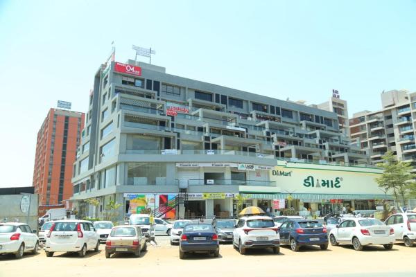Na zdjęciu widoczny jest obiekt HOTEL OM INN położony w mieście Gandhinagar.