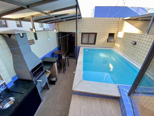 A la foto es mostra l'objecte Cobertura Piscina Privativa frente e Vista Mar Centro Mongaguá situat a la ciutat de Mongaguá.