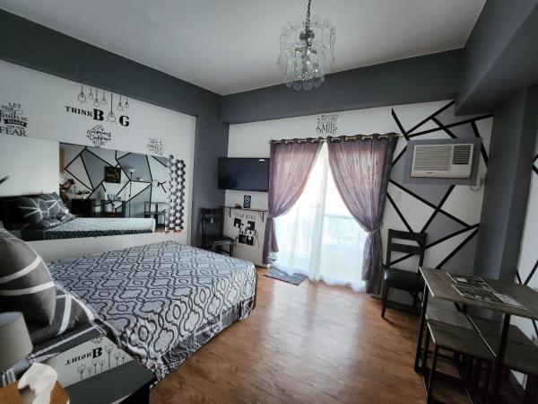 A la foto es mostra l'objecte Condo Azur Suites A125 Amani Resorts Residences , 5 minutes Airport, Netflix, Stylish, Cozy with Luxurious Swimming Pool situat a la ciutat de Pusok.