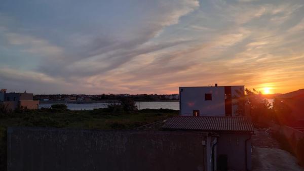 Φωτογραφία 7: Sunset view at the sandy beach - Nin luxury apartment