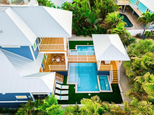 En la foto se muestra el objeto Slice of Paradise managed by Beach Retreats ubicado en la ciudad de Holmes Beach.