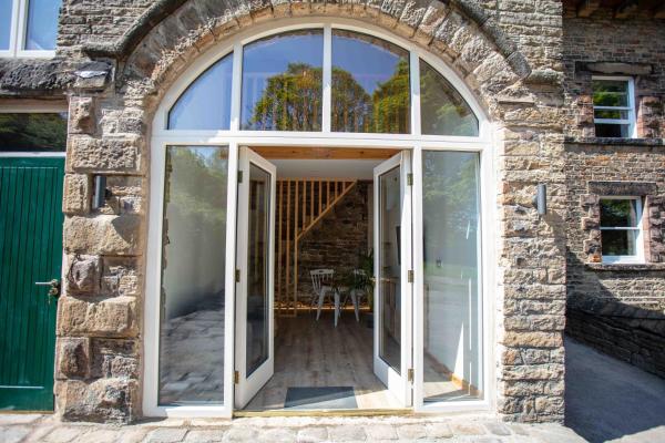 A la foto es mostra l'objecte Stunning stone coach house situat a la ciutat de Marple.