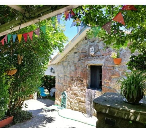 A la foto es mostra l'objecte Casita de campo cerca de playas. situat a la ciutat de Lourizán.