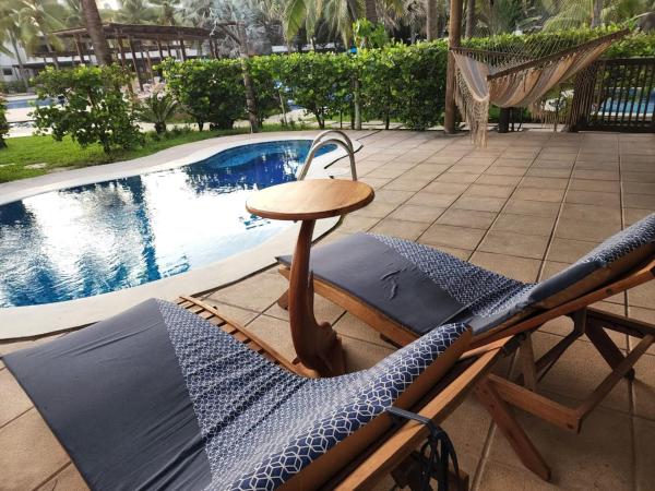 Auf dem Foto ist das Objekt Apartamentos Los Cabos Monterrico by l´Aurora Inn in der Stadt Taxisco zu sehen.