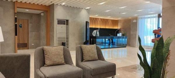A la foto es mostra l'objecte Cozy 1 Bedroom with balcony facing pool near MOA,IKEA near situat a la ciutat de Manila.