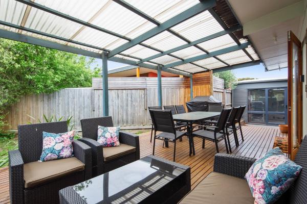 The photo shows the Ocean Reach Sunset Villa located in the city of Cape Woolamai.