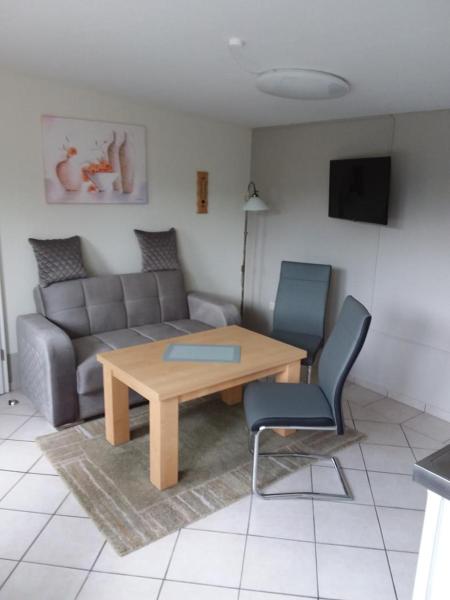 На фото показан объект NEU Ferienhaus am Saaler Bodden, расположенный в городе Bartelshagen.
