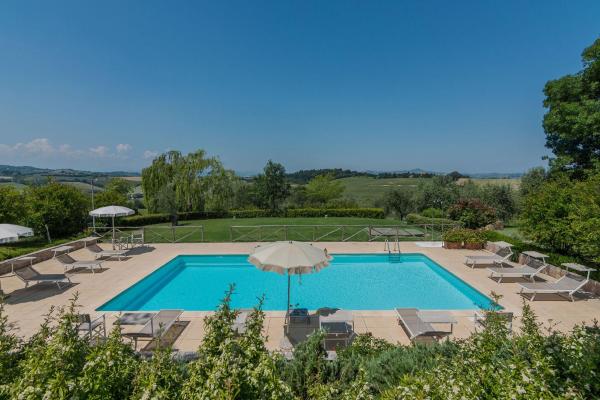 A la foto es mostra l'objecte Villa Il Fiore e la Farfalla situat a la ciutat de Pesaro.