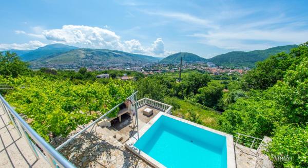The photo shows the Perfect view of Mostar - with swimming pool located in the city of Goranci.