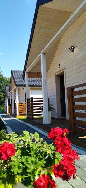 A la foto es mostra l'objecte Domki Magnolia Noclegi & SPA Zator situat a la ciutat de Zator.