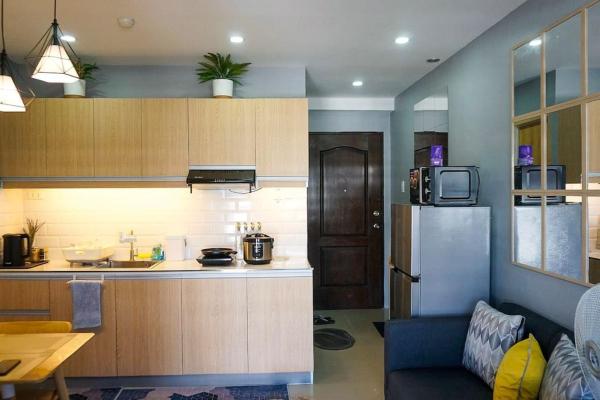 A la foto es mostra l'objecte THE FIKA ROOM near MNL Airport - Scandi Studio Unit with Fast Wi-Fi & Netflix - Read Full Property Desc before booking situat a la ciutat de Manila.