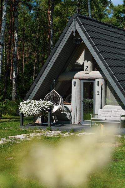 The photo shows the Nordicstay Noarootsi Saunahouse located in the city of Paslepa.