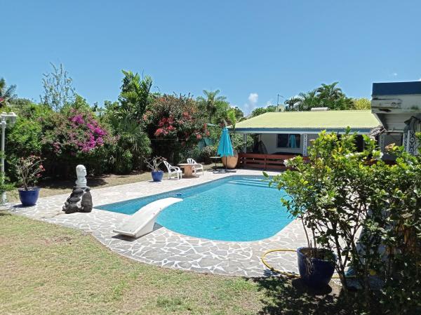 Maison de vacances avec piscine et accès plage de sable blanc, Punaauia