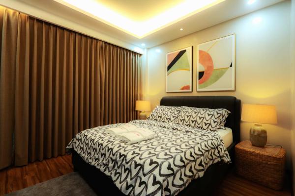 A la foto es mostra l'objecte Gloria Tree Mayon and Park View Residences situat a la ciutat de Legazpi.