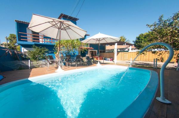 På billedet ses objektet Casa no Campeche, com piscina, à 100 m do mar beliggende i byen Florianópolis.