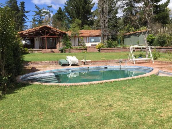 På billedet ses objektet Alojamiento Punta verde Gran casa orilla Lago Rapel piscina ,jardines ,quincho ,terrazas,para 13 beliggende i byen Las Cabras.