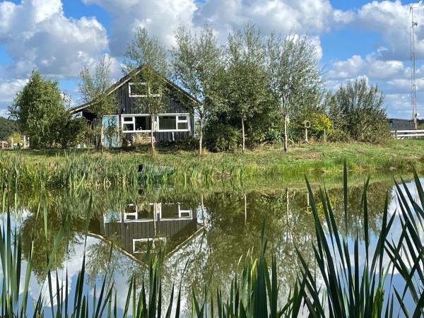 Foto 4: Het Riethuis