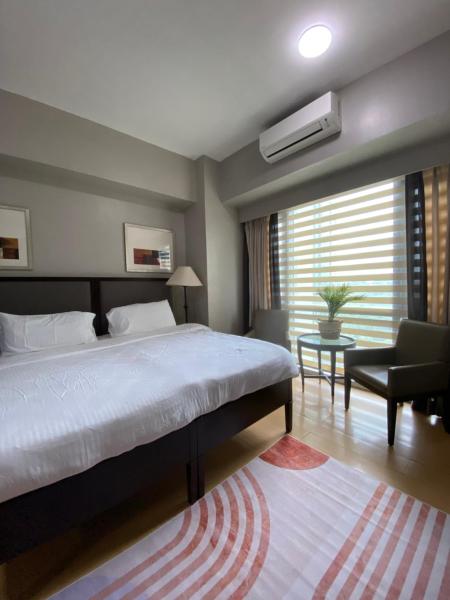 A la foto es mostra l'objecte Avant at the Fort by Urban Realty situat a la ciutat de Manila.