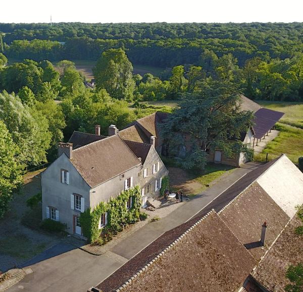 Na fotografii je vidět objekt La Maison d'Eugénie - Un cocon au coeur de la nature, à 20 minutes de Disneyland ParisⓇ nacházející se ve městě Mortcerf.