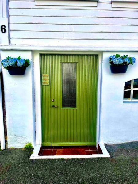La photo montre l'objet The Green Door H1 situé dans la ville de Stavanger.