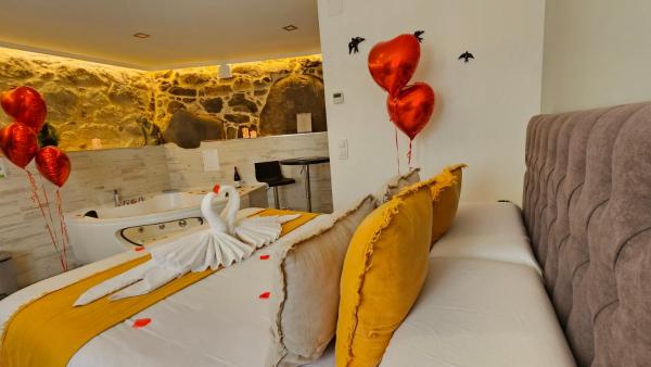 Na fotografii je vidět objekt Loft con Jacuzzi os Arcos nacházející se ve městě Sober.
