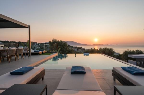A la foto es mostra l'objecte Villa Ekphrasis with sea view and jacuzzi situat a la ciutat de Ravdhoúkha.