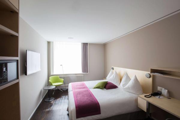 Na foto é possível ver o objeto Hotel Spirgarten localizado na cidade de Uitikon.
