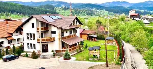 The photo shows the Pensiunea Ioana located in the city of Sadova.