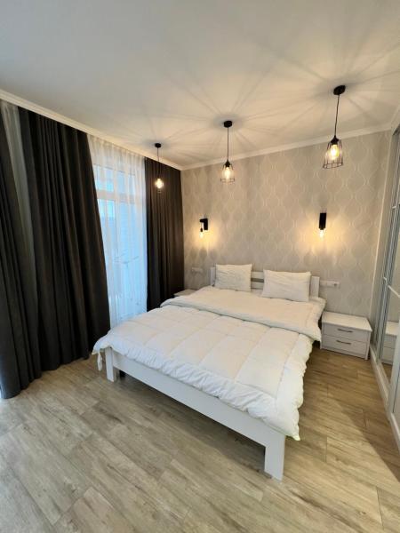 A la foto es mostra l'objecte Sunny apartment в ЖК Сонячний Квартал situat a la ciutat de Golubinoye.